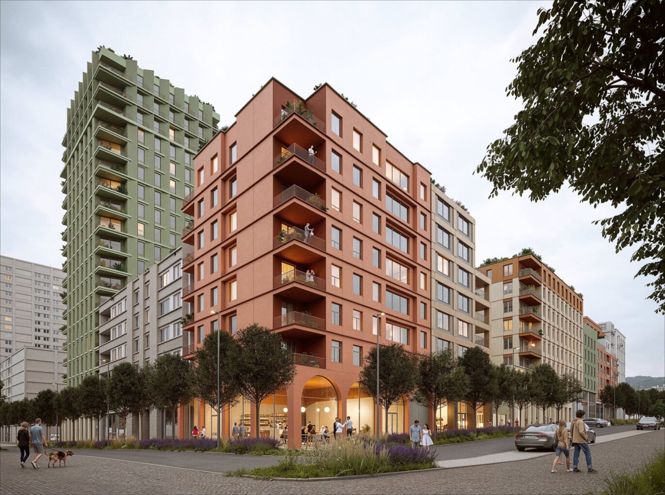 Uliční pohled na blok Nové Dvory s podloubím a obytnou věží v pozadí, návrh od architektů z MA Studia