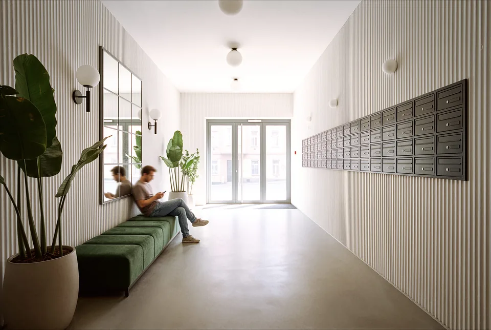 Vstupní hala bytového domu Primátorská, návrh od architektů z MA Studia